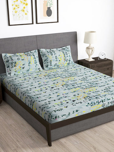 https://cdn.shopify.com/s/files/1/1857/6931/products/39223c0a-51f3-4ddf-adaa-de6686a659e41685959528216-Storyhome-Arena-Grey--Blue-Floral-Printed-180-TC-Queen-Bedsh-1.jpg?v=1703226766
